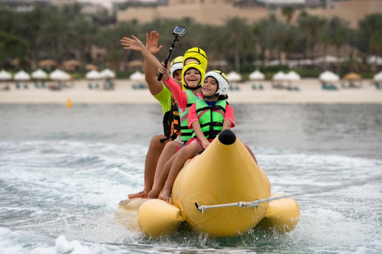 Jumeirah Zabeel Saray Dubai Exterior photo A family on a bumper boat